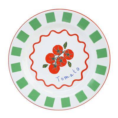 Decorative plate with tomato design and green border on a white background