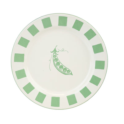 Round plate with green square patterns on border and a pea design in the center on a white background